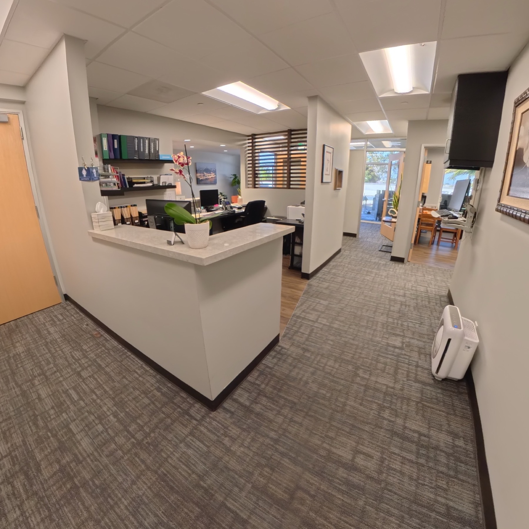 Front desk and reception area inside the dental office