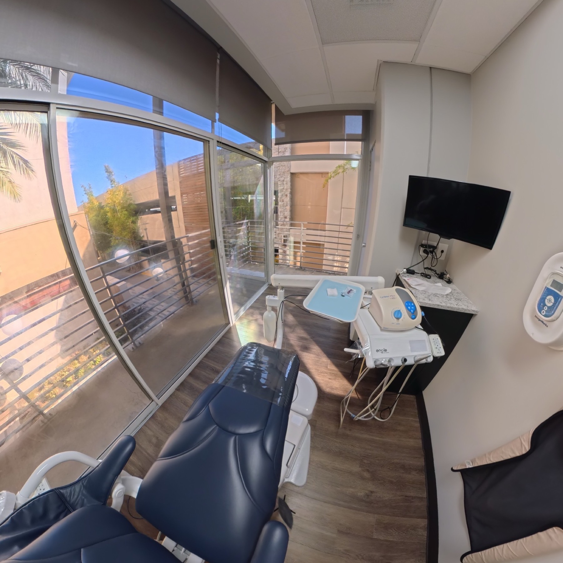 Private treatment room with floor-to-ceiling windows